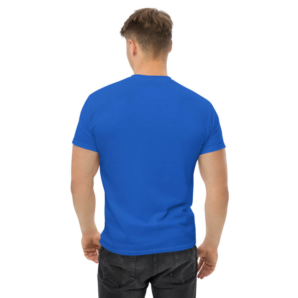 Back view of a plain blue t-shirt mockup, displayed on a male model with no design or graphics